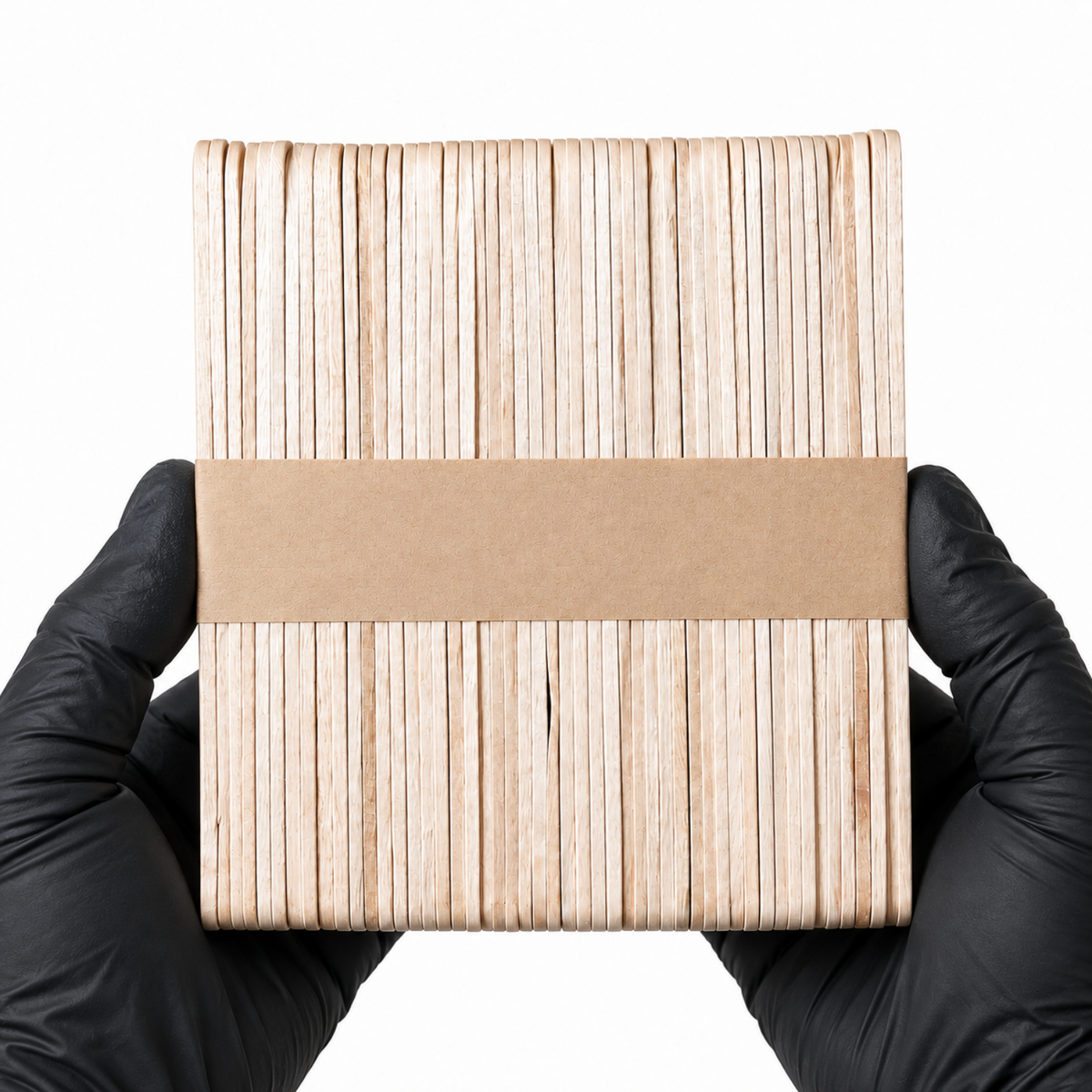 Small wooden waxing spatula bundle in hand